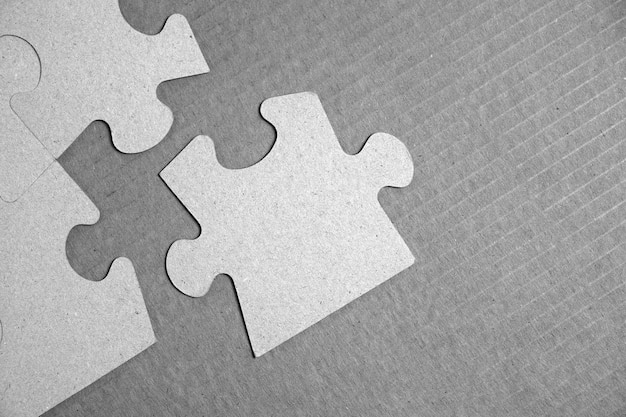 Missing piece of the puzzle falls into place.Black and white image.