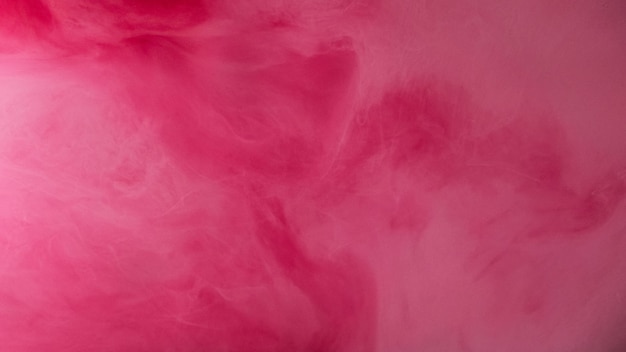 Mist cloud paint water splash defocused pink color dust particles texture steam floating spreading