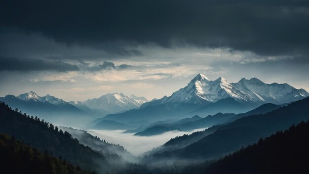 Misty beauty of towering mountains creating an ethereal and dramatic landscape at sunrise