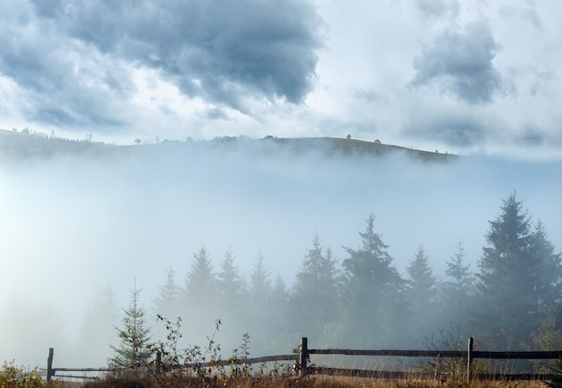 Misty daybreak in autumn Carpathian mountain, Ukraine.