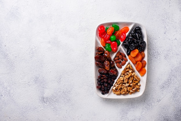 Mix of dried fruits and nuts in plate