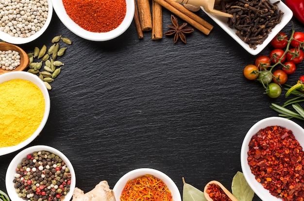 Mix of flavored spices powder on table