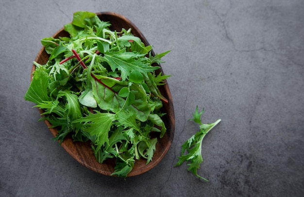 Mix of fresh green salad leaves with arugula and beets