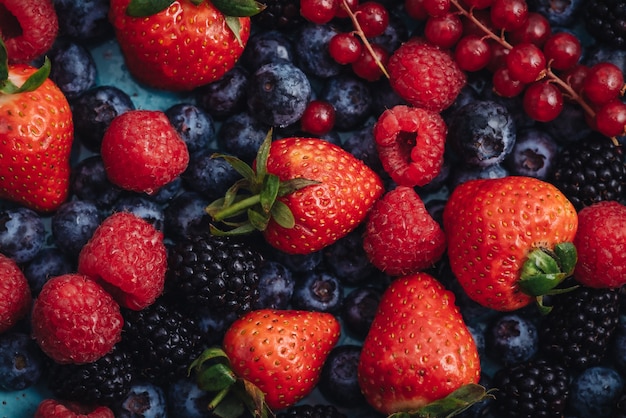 Mix of fresh RAW berries fruits for healthy eating