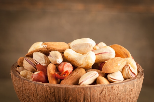 Mix of nuts on a wooden table