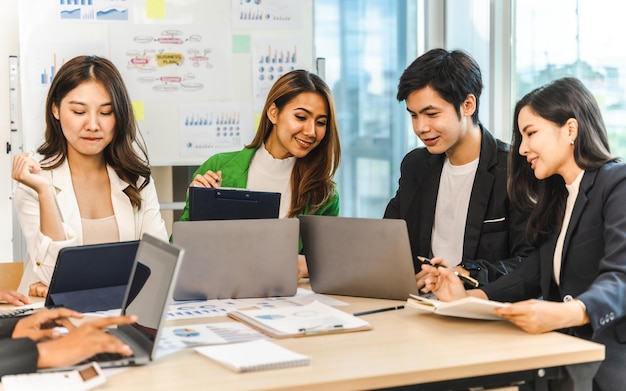 Mix race young start up business people meeting at office desk in modern workplace