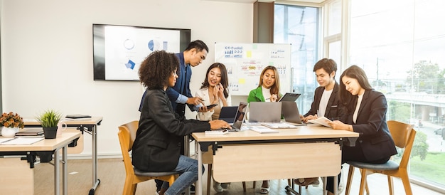 Mix race young start up business people meeting at office desk in modern workplace