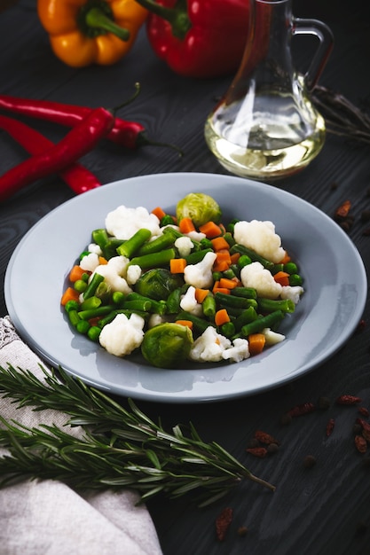 Mix of vegetables on a blue plate