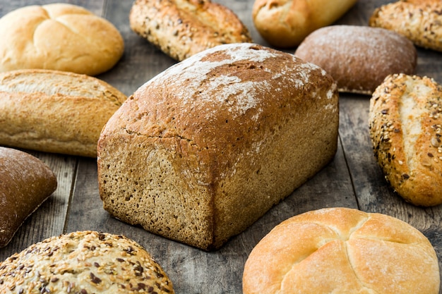 Mixed bread on wooden table