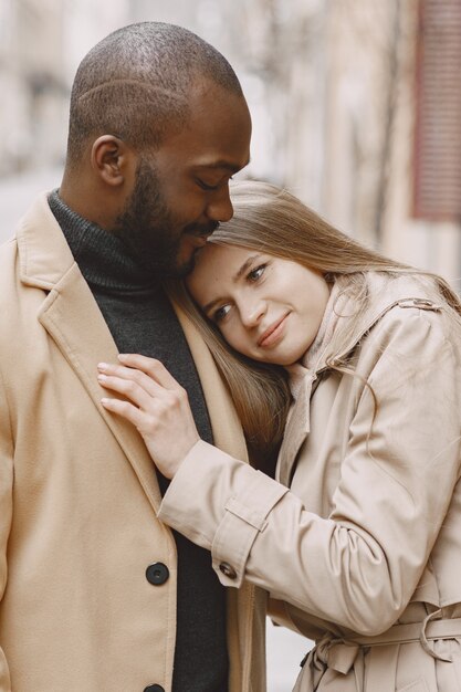 Mixed couple spenting time together in a spring city