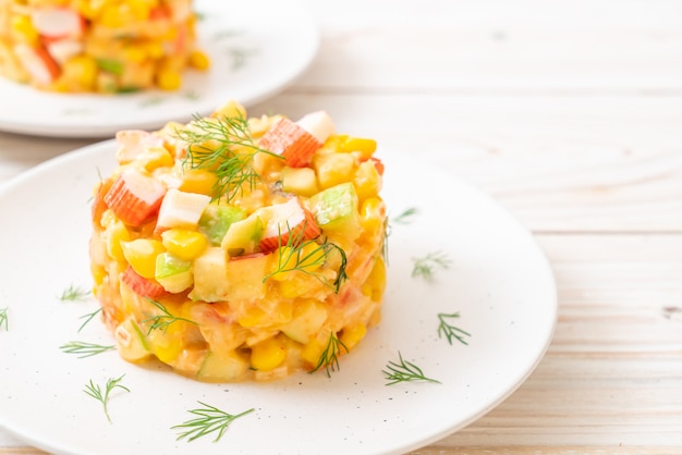 mixed fruit salad with crab stick (apple, corn, papaya, pineapple)