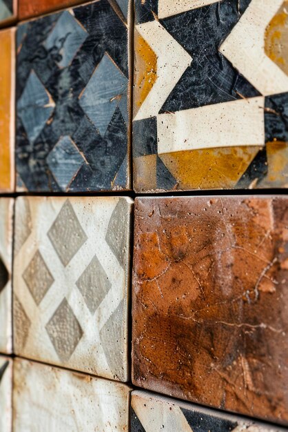 Photo mixed pattern tiled wall close up