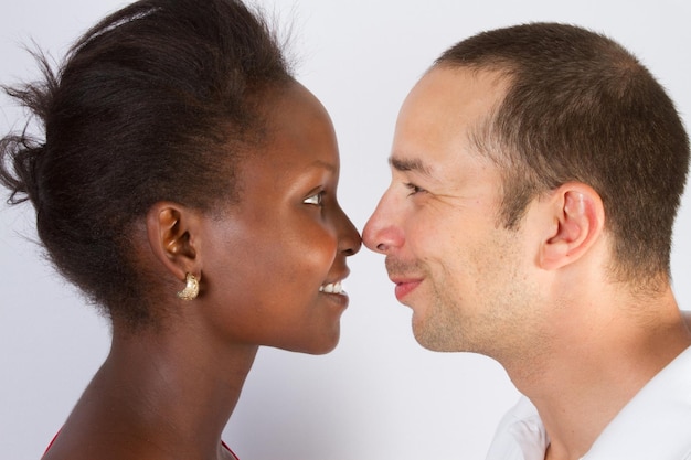 Mixed race couple of millennial Caucasian man love his African-American woman