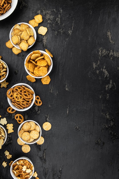 Mixed Snacks on dark background close up shot selective focus