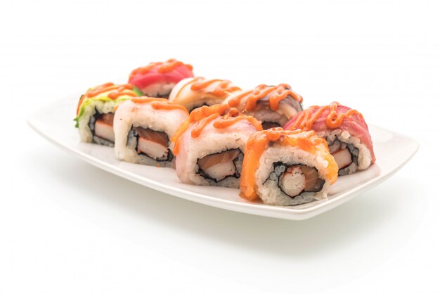 mixed sushi roll with spicy sauce - japanese food style