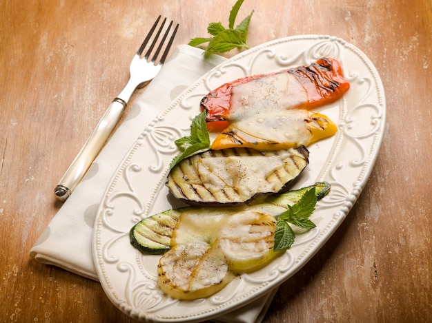 Mixed vegetables grilled with scamorza cheese