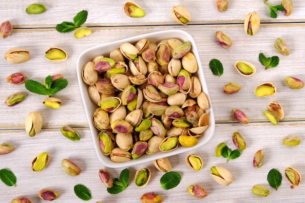 Mixed with peeled and unpeeled pistachios top view