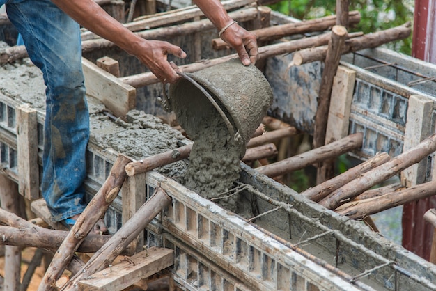 Photo mixing concrete pour during floor.