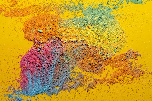 Mixture of multicolored powder is scattered randomly