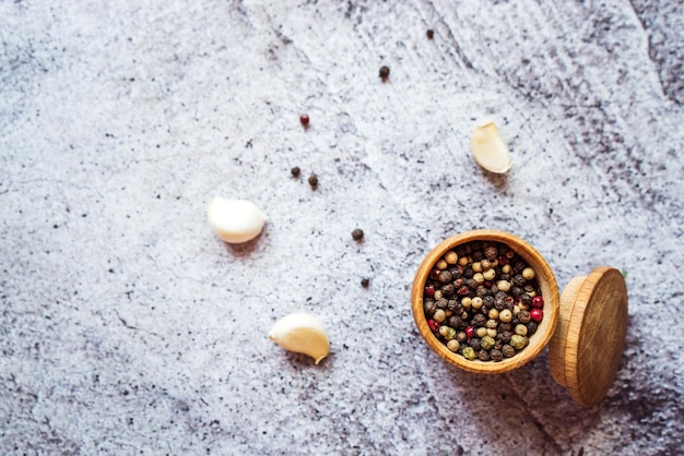 A mixture of peppers and garlic are on the table