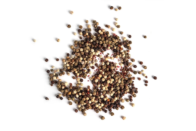 A mixture of peppers isolated on a white background The spice is a mixture of peppers