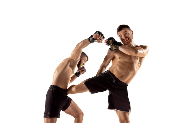 MMA Two professional fightesr punching or boxing isolated on white studio background