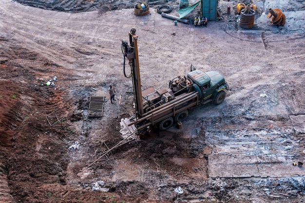 Mobile drilling rig mounted on a truck during operation top view