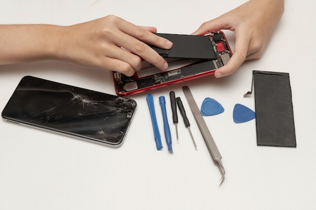 Mobile phone or smartphone repair technician