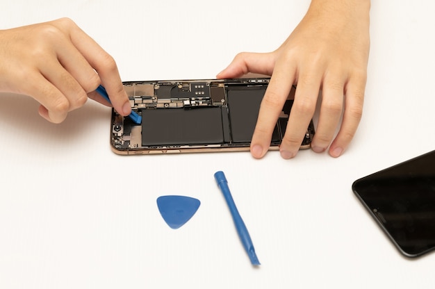 Mobile phone or smartphone repair technician