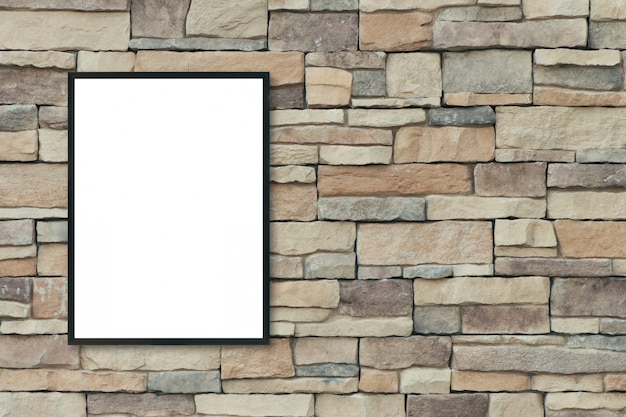 Mock up blank poster picture frame on brick wall.