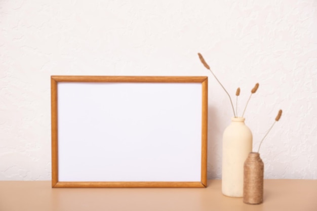 Mock up empty wooden frame mockup dried grass in vase on white background interior home design Art concept copy space