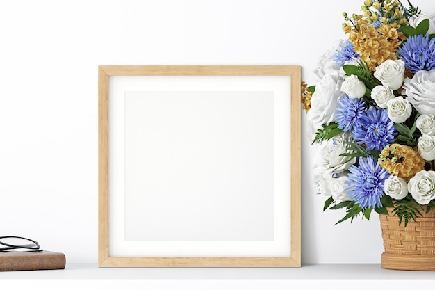 Mock up frame next to a bouquet of flowers