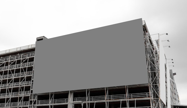 Mock up grey background billboard on parking lot building Clipping path for mockup