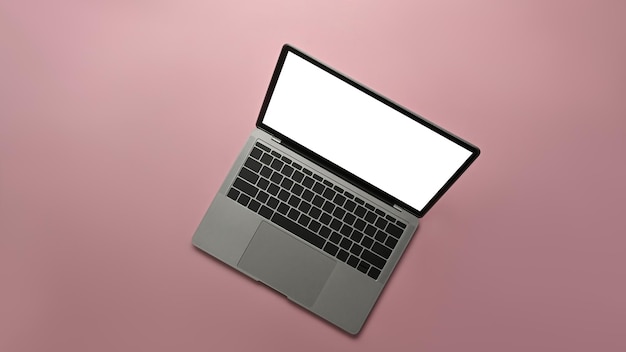 Mock up laptop computer with white screen on pink background Blank screen for your advertise design