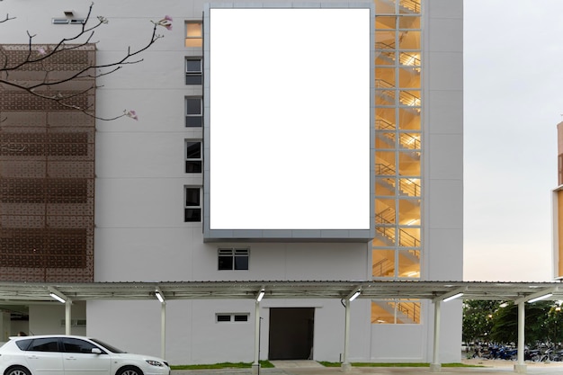 Mock up A large blank billboard on a street wall signboard with room to add your own message