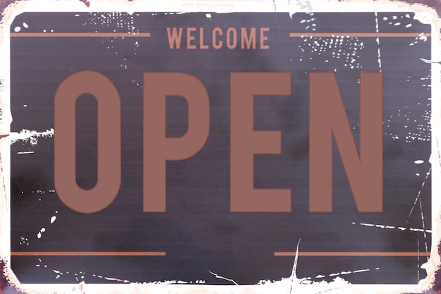 Mock up sign with message Welcome OPEN on brown background