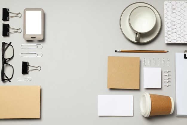 Mockup flat lay with different office accessories on light gray background