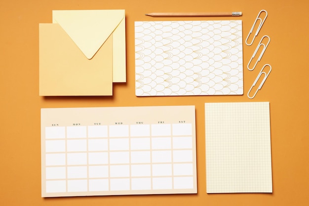 Mockup flat lay with freelancer accessories on beige background