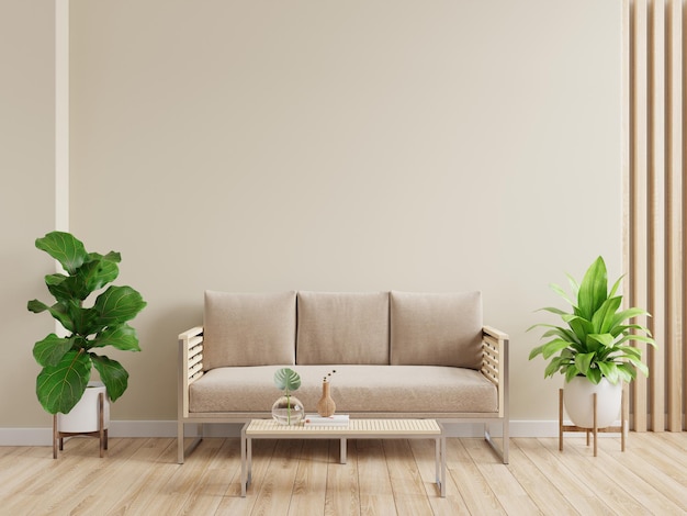 Mockup living room interior with sofa on empty cream color wall background.3D rendering