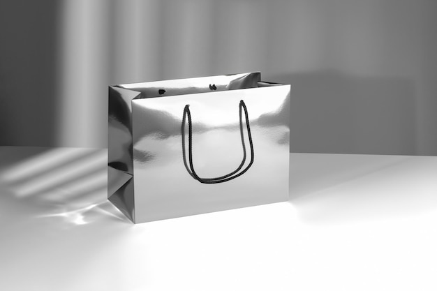 Mockup of a package with handles made of metallized cardboard without logo