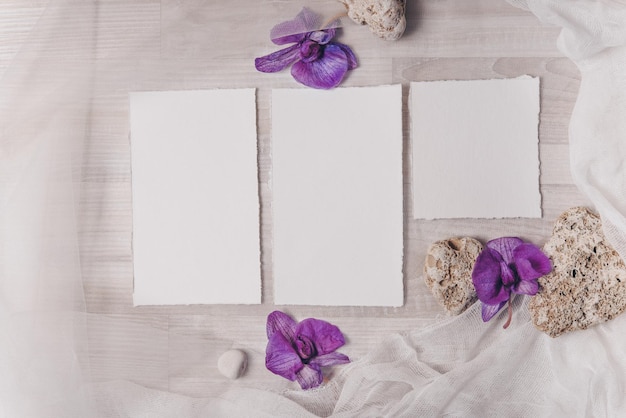 Mockup wedding greeting cards with top view flat lay on a pink background place for your text