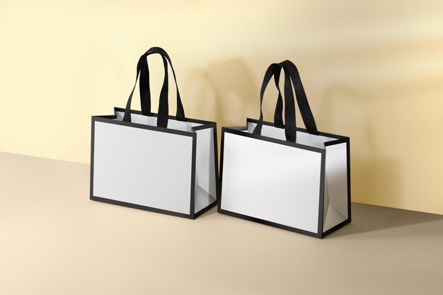 Mockup of a white paper bag with black border and black fabric handles