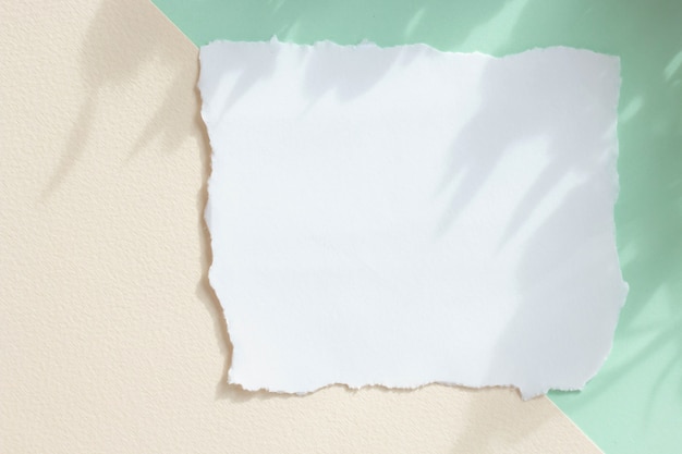 Mockup of a white paper card on pastel background