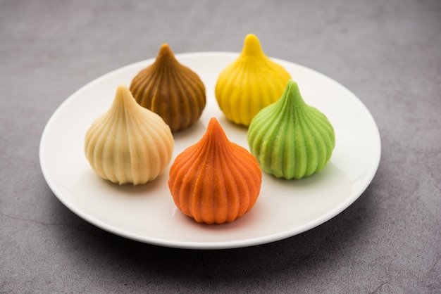 Modak is an Indian sweet dumpling offered to Lord Ganapati on Ganesh Chaturthi Festival. Served in a plate. Selective focus