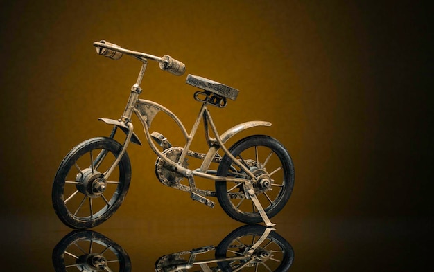 Photo model of bronze vintage bike on a sepia/brown background