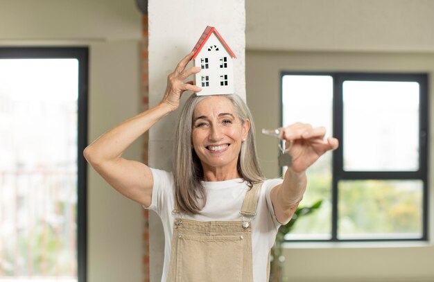 Photo model holding a house home concept