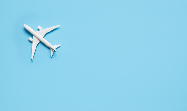 Model planeairplane on blue pastel color background