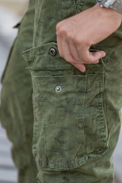 Model wearing cargo pants or cargo trousers.