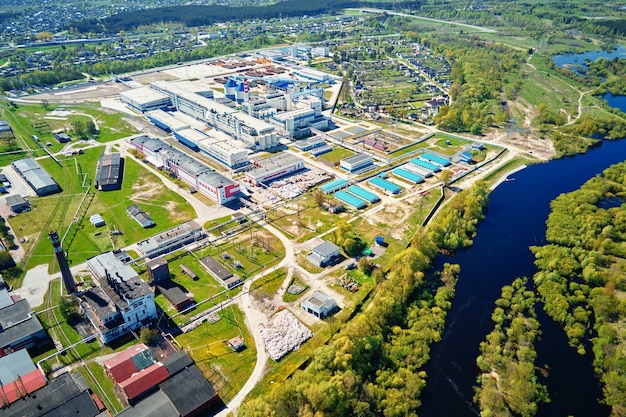 Moder paper factory aerial view industrial plant in summer day city landscape