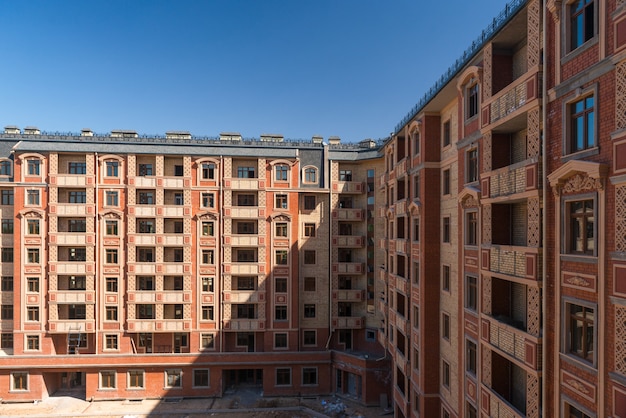 Modern apartment complex design. Building under construction